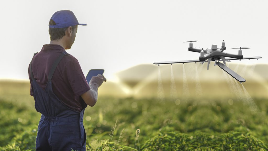 A drone waters crops.