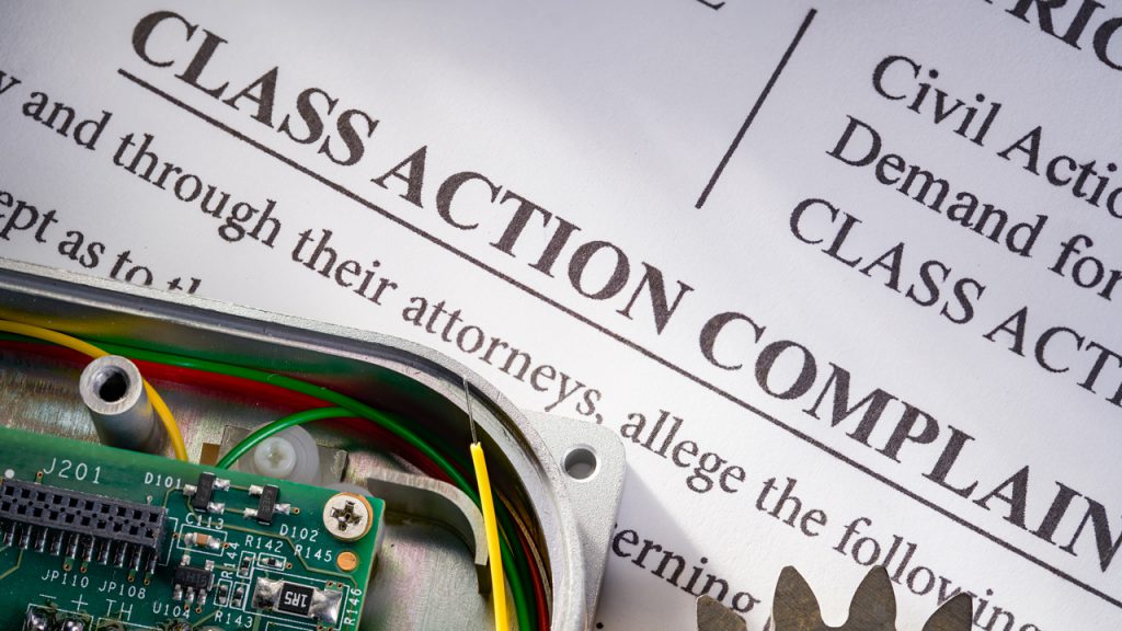 A class action complaint with a circuitboard.
