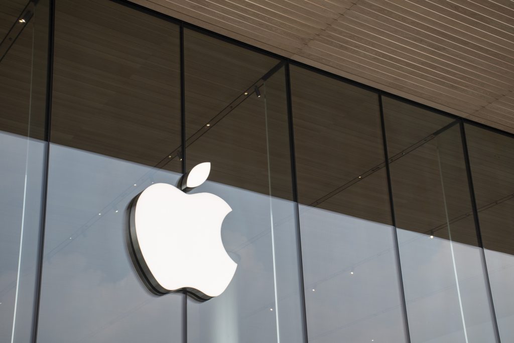 Apple's logo on a store window.