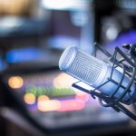 A microphone in a broadcast studio.