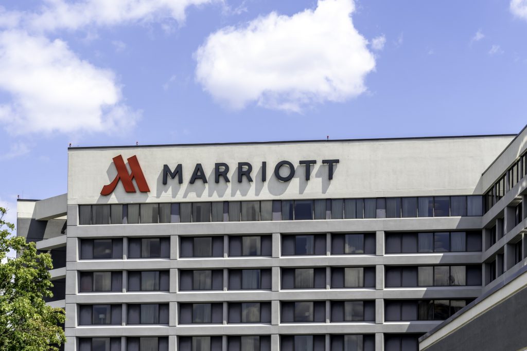 A Marriott logo on the side of a hotel.