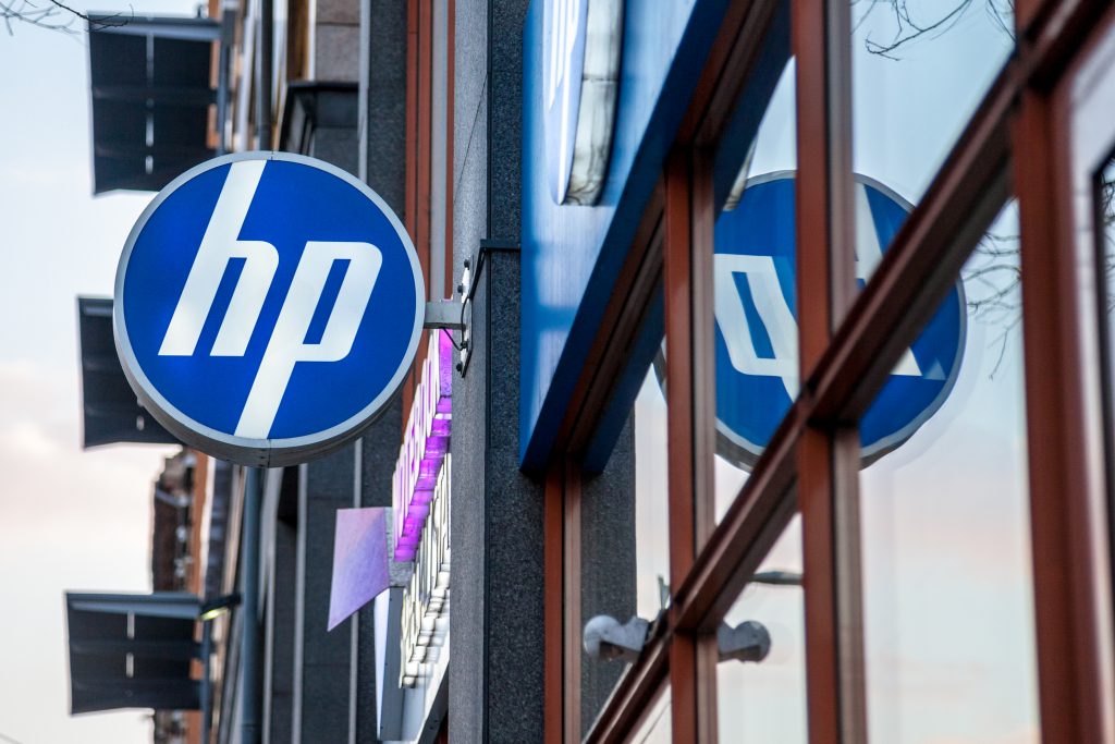 Hewlett-Packard's logo on a glass background.
